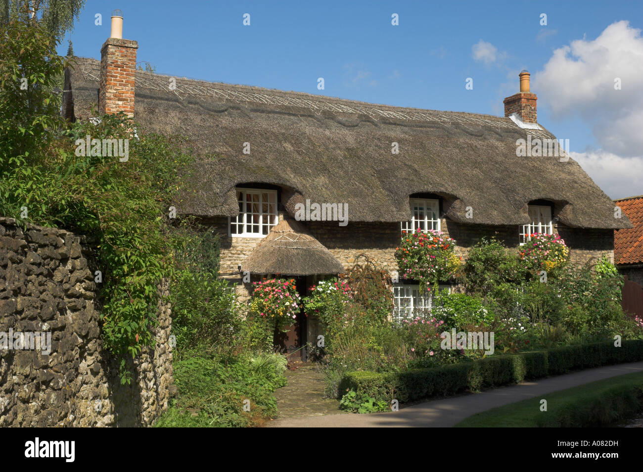 Picturesque thatched cottage at Thornton le dale North Yorkshire Stock Photo
