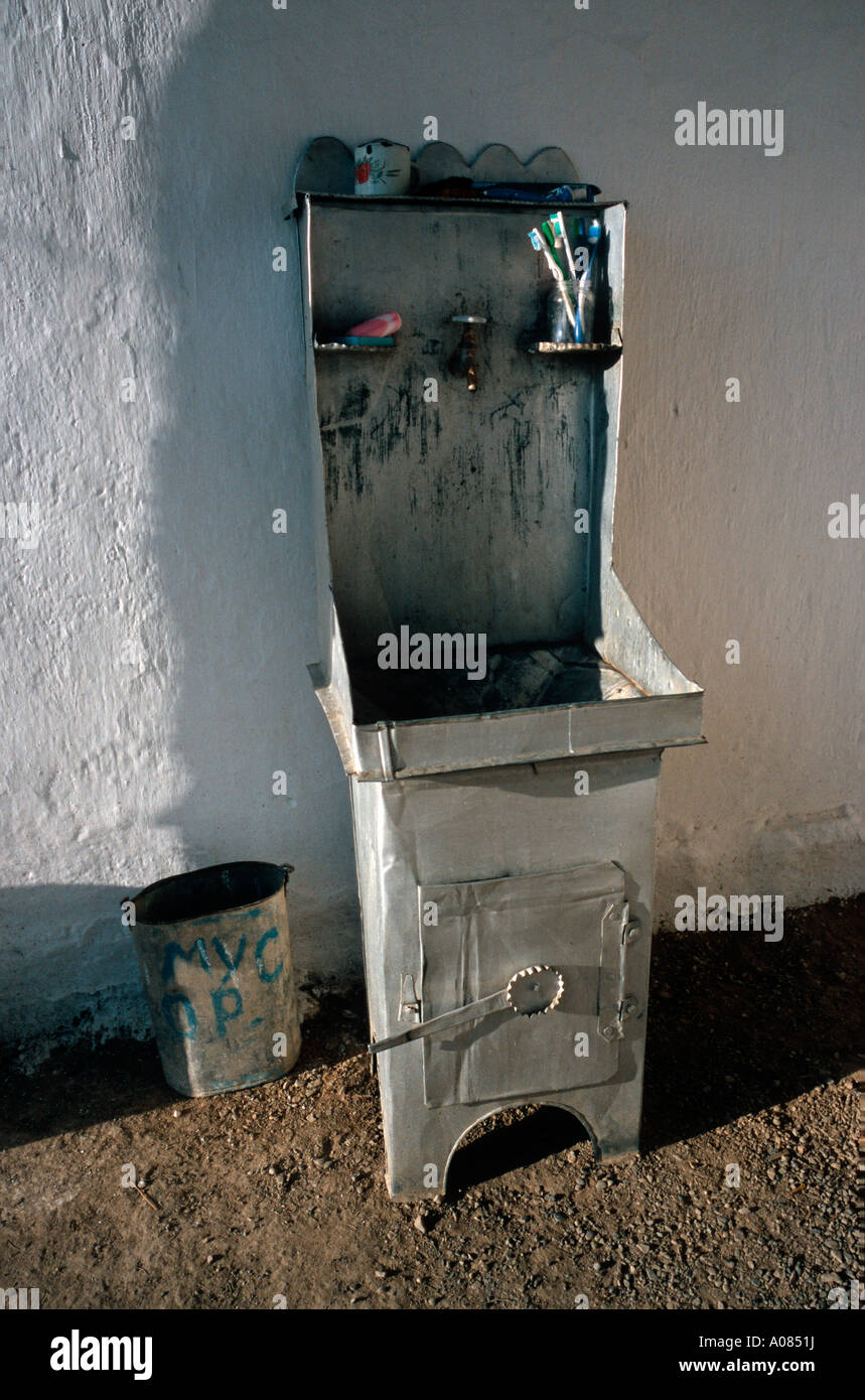 Washing facilities inside a traditional Kyrgyz home in the town of Kazarman. Stock Photo