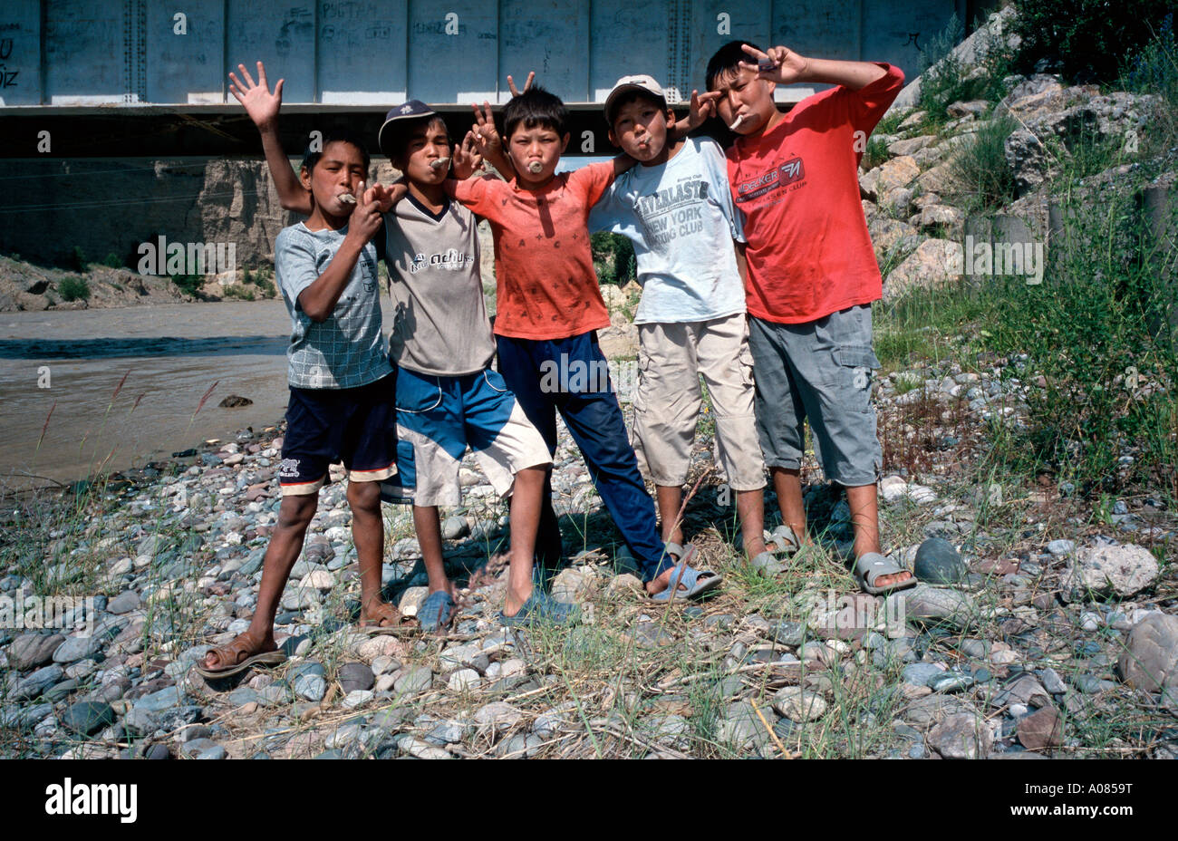 Local kids in the Kyrgyz town of Kazarman. Stock Photo