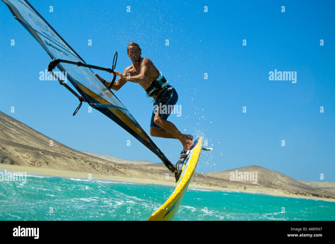 Windsurfing jump Sotavento Fuerteventura ESP SPAIN Stock Photo