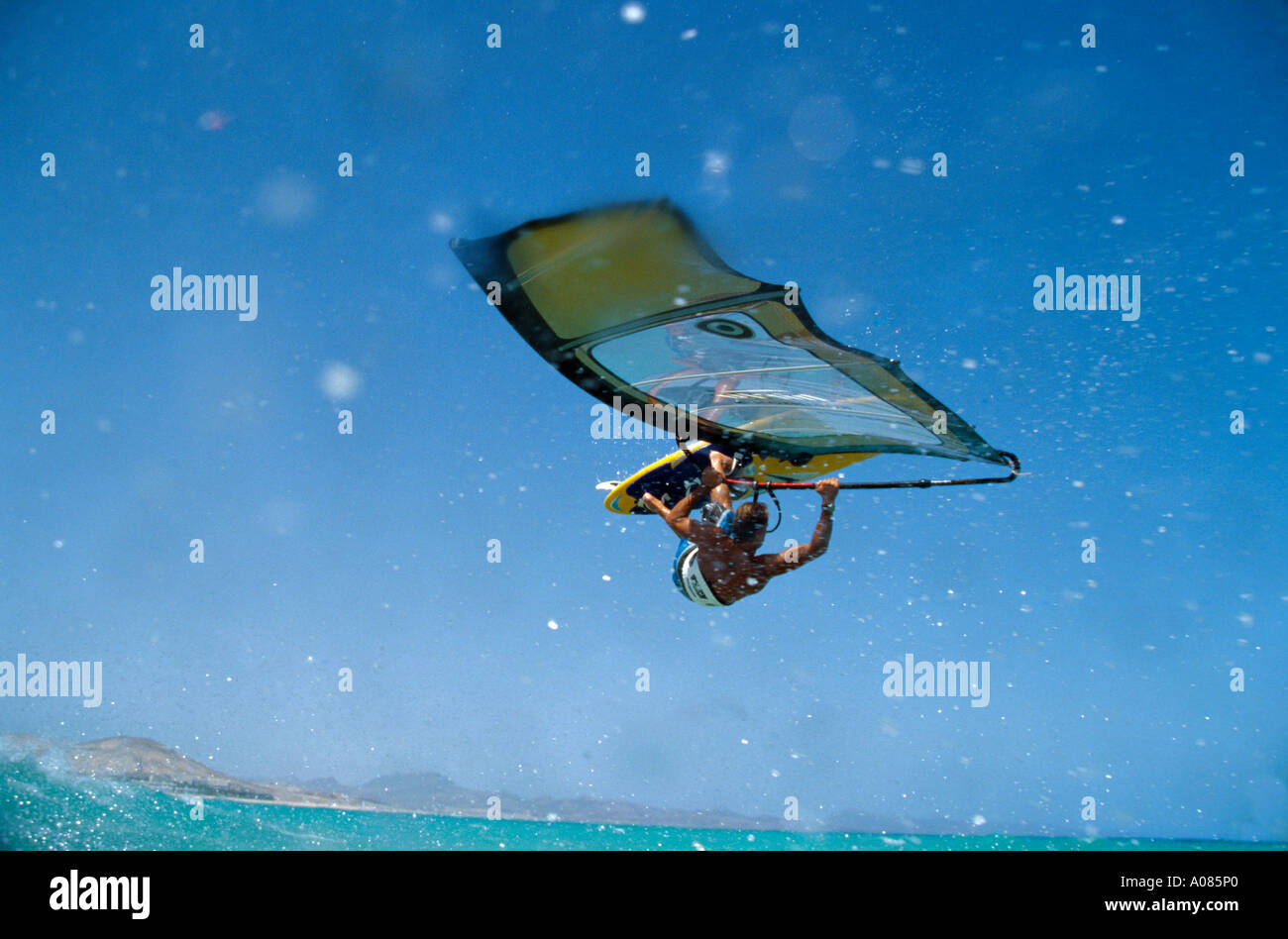 Windsurfing jump Sotavento Fuerteventura ESP SPAIN Stock Photo