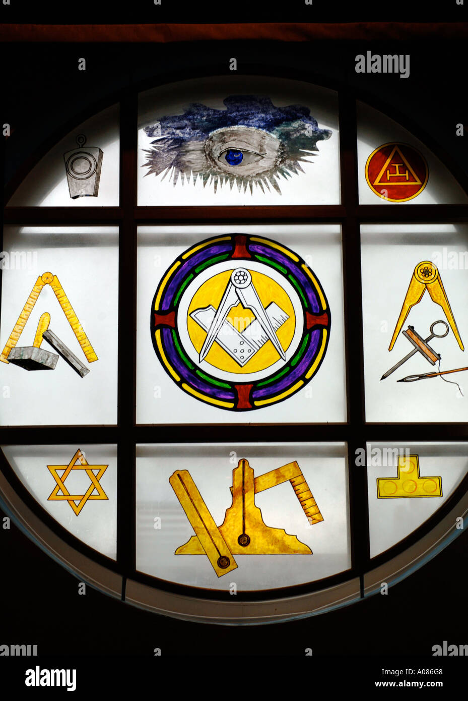 Close up of a plate glass window showing masonic symbols in a Freemasons Lodge Stock Photo