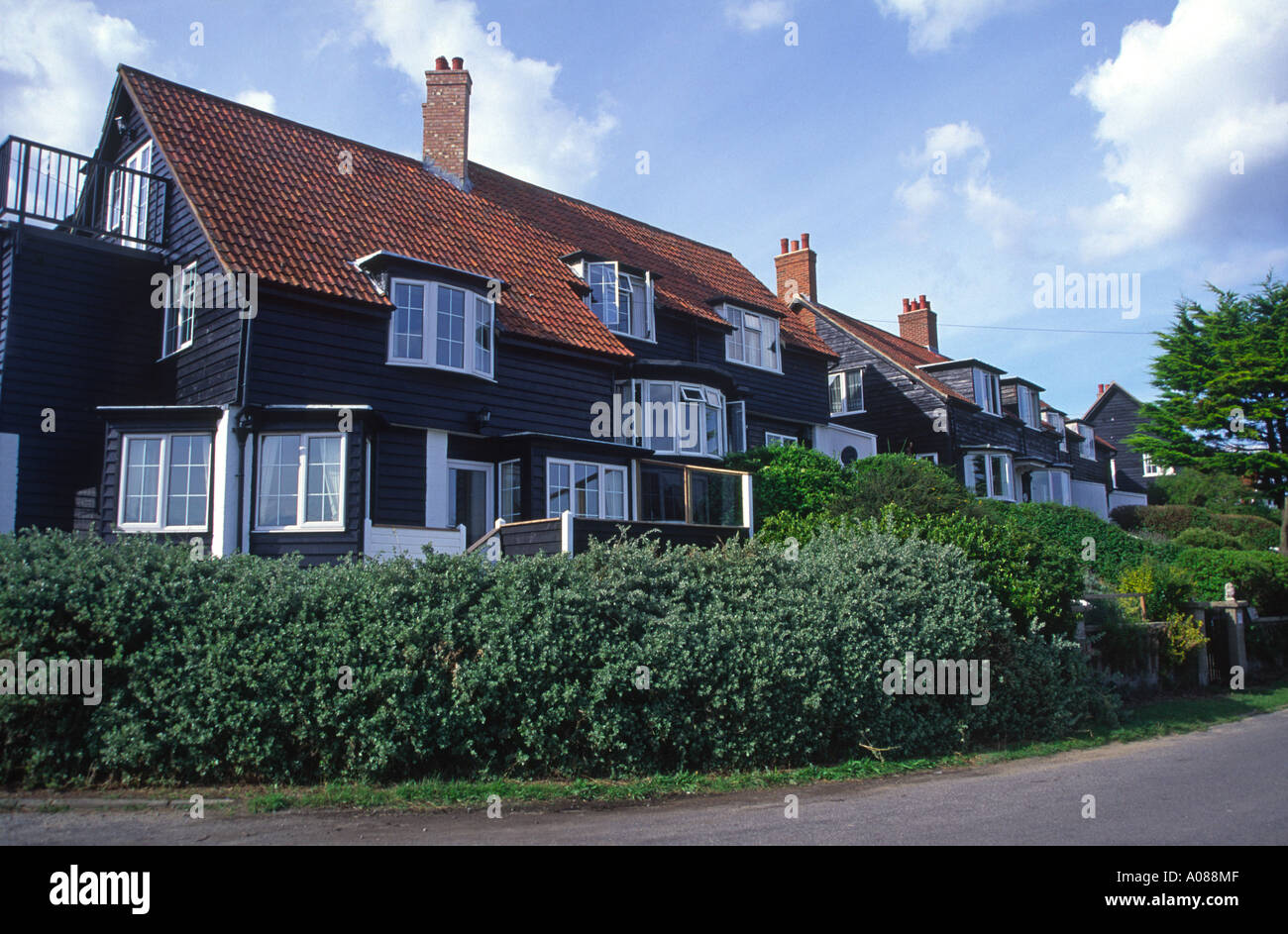 Wooden holiday home houses Thorpeness Suffolk England Stock Photo