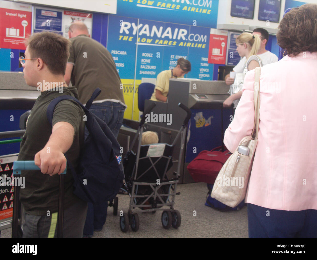 Ryanair check in desk queue Stansted airport England Stock Photo Alamy