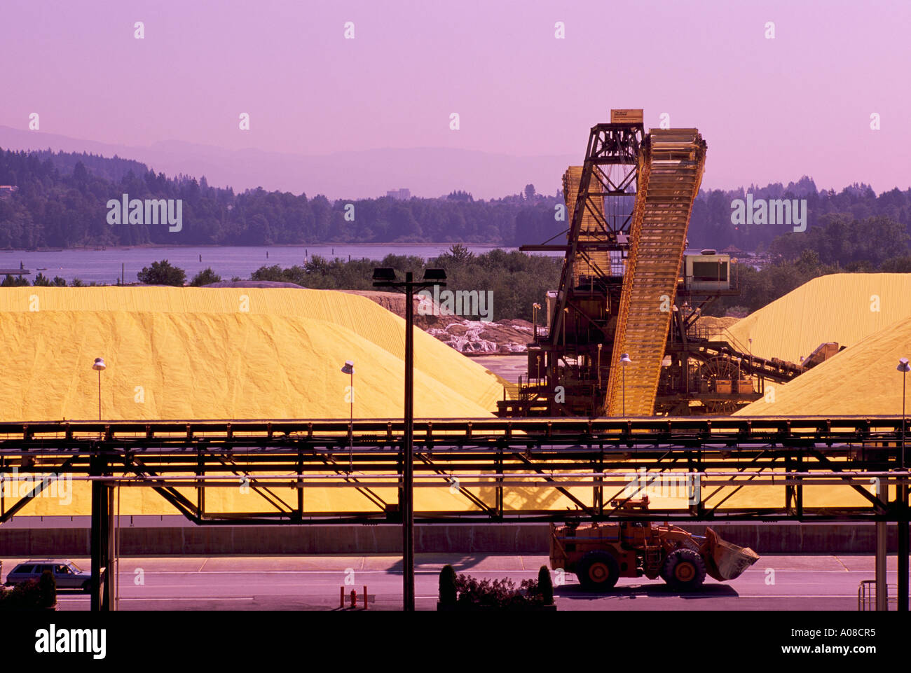 Port Moody, Port of Vancouver, BC, British Columbia, Canada - Sulphur Piles Storage at Shipping Terminal Facility, Industry Stock Photo