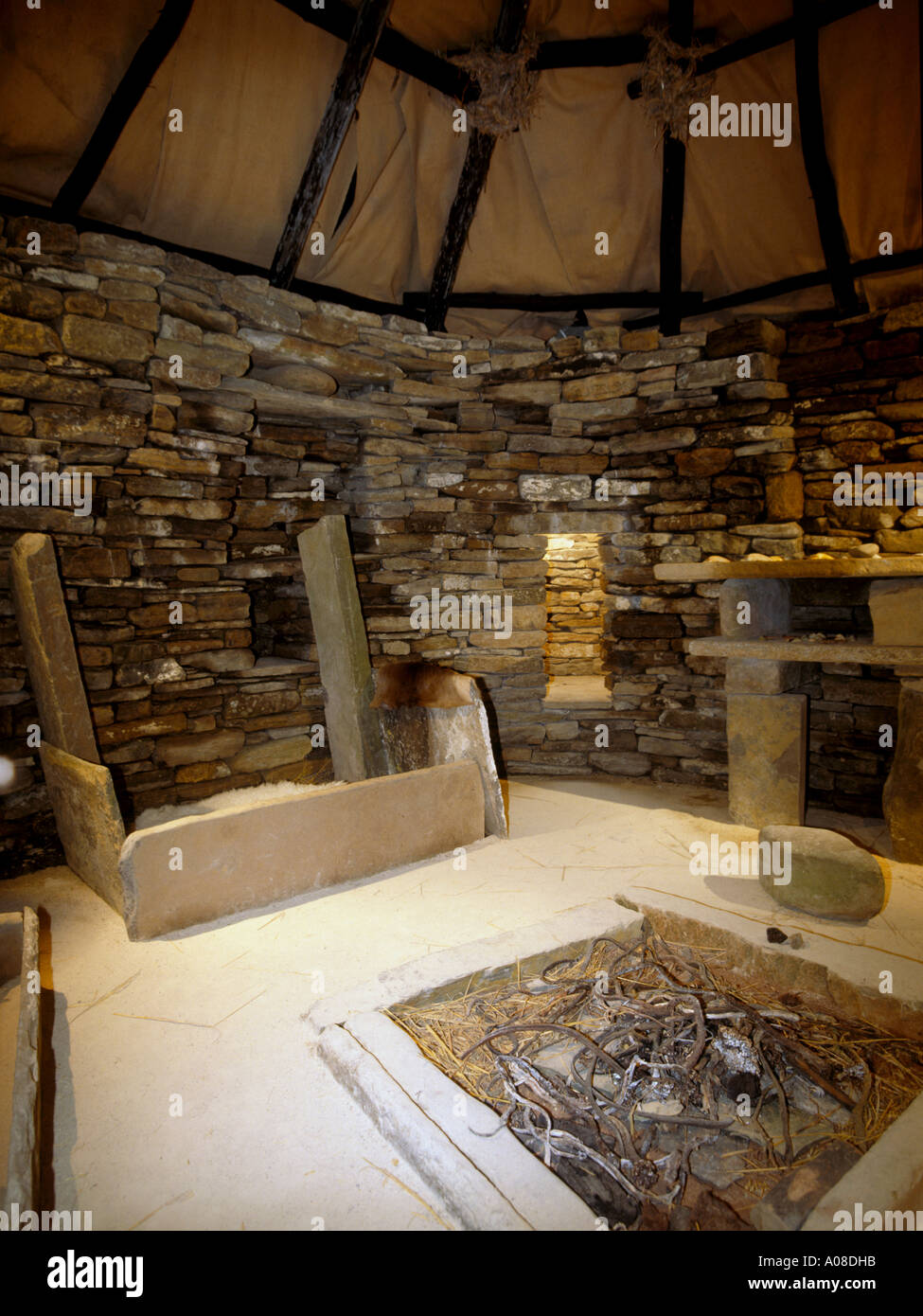 dh Replica SKARA BRAE ORKNEY Box bed and fireplace inside replica of prehistoric house neolithic hearth bronze age reconstruction furniture britain Stock Photo