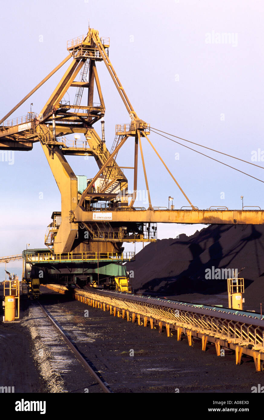 Stacker-Reclaimer loading Coal by Conveyor Belt at Westshore Terminals at Roberts Bank near Vancouver in British Columbia Canada Stock Photo