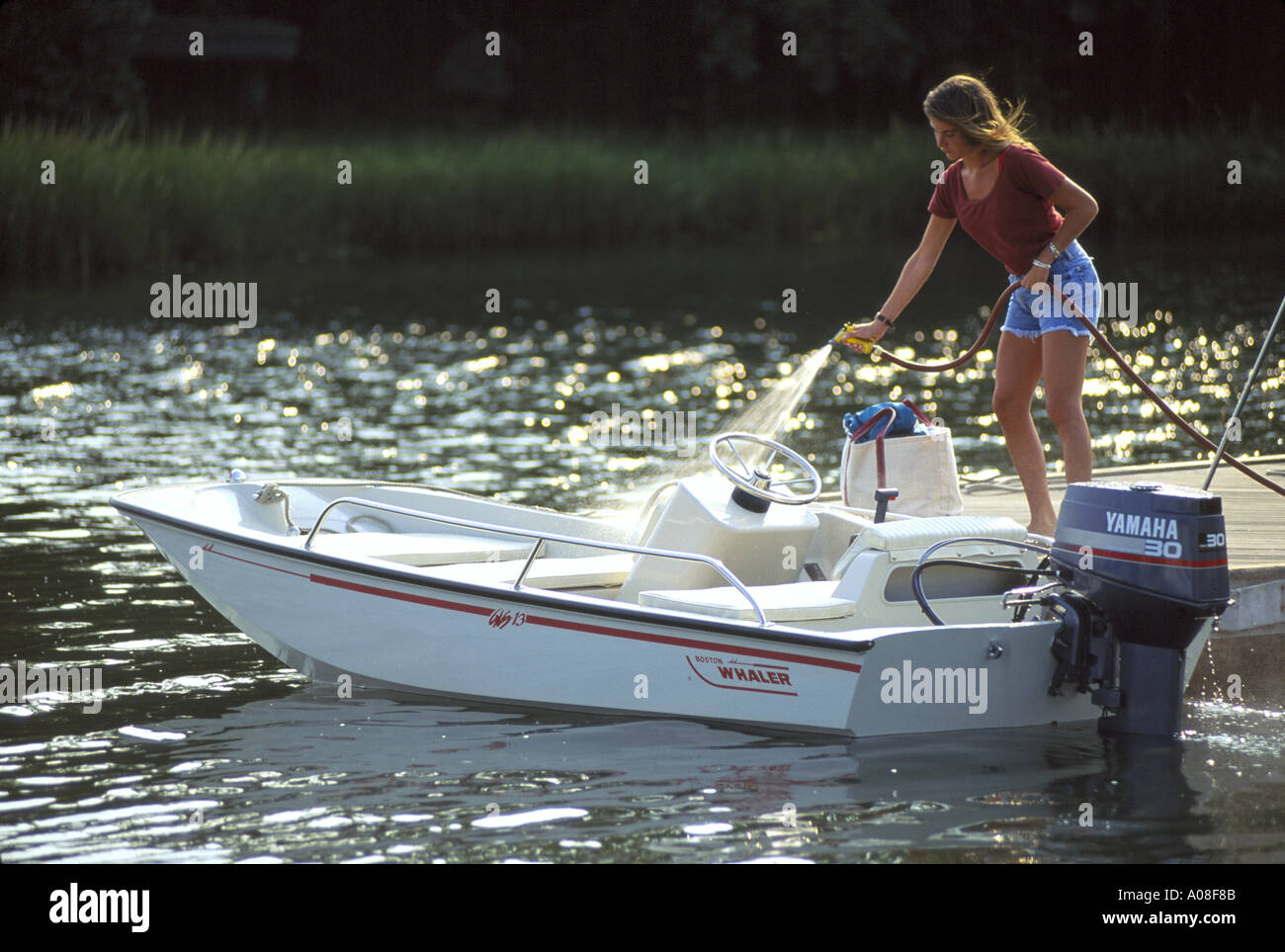 Washing a boat Stock Photo Alamy