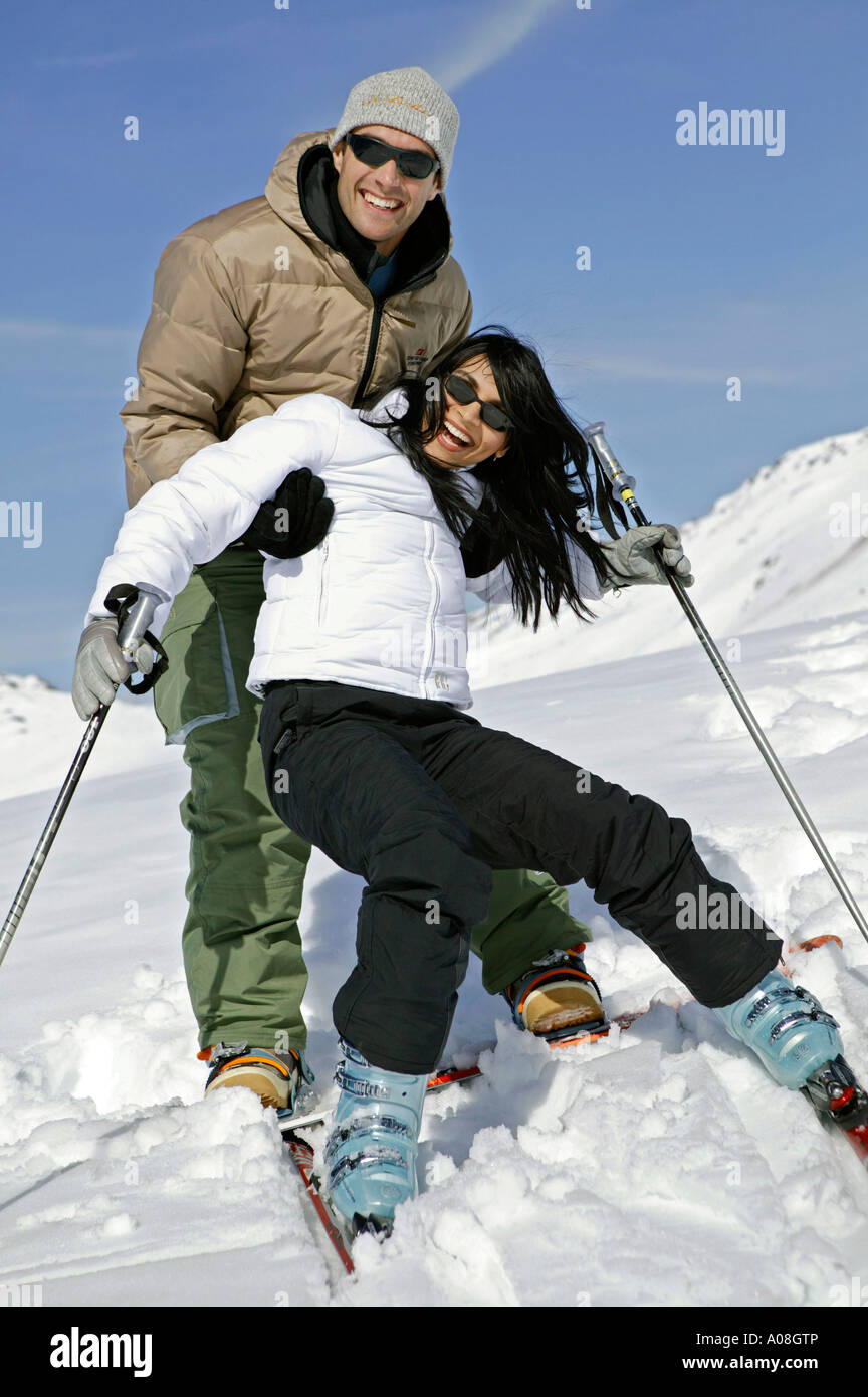 Junges Paar hat Spass im Winterurlaub, young couple having fun at winter holiday Stock Photo