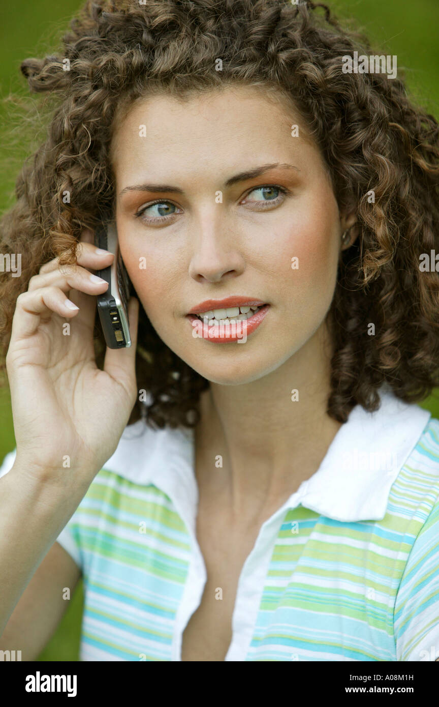Frau telefoniert mit einem Handy, woman calling on a mobile Stock Photo
