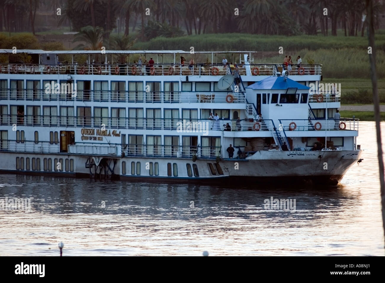 Tourist boat on the Nile river at sunset, Luxor, Egypt Stock Photo - Alamy