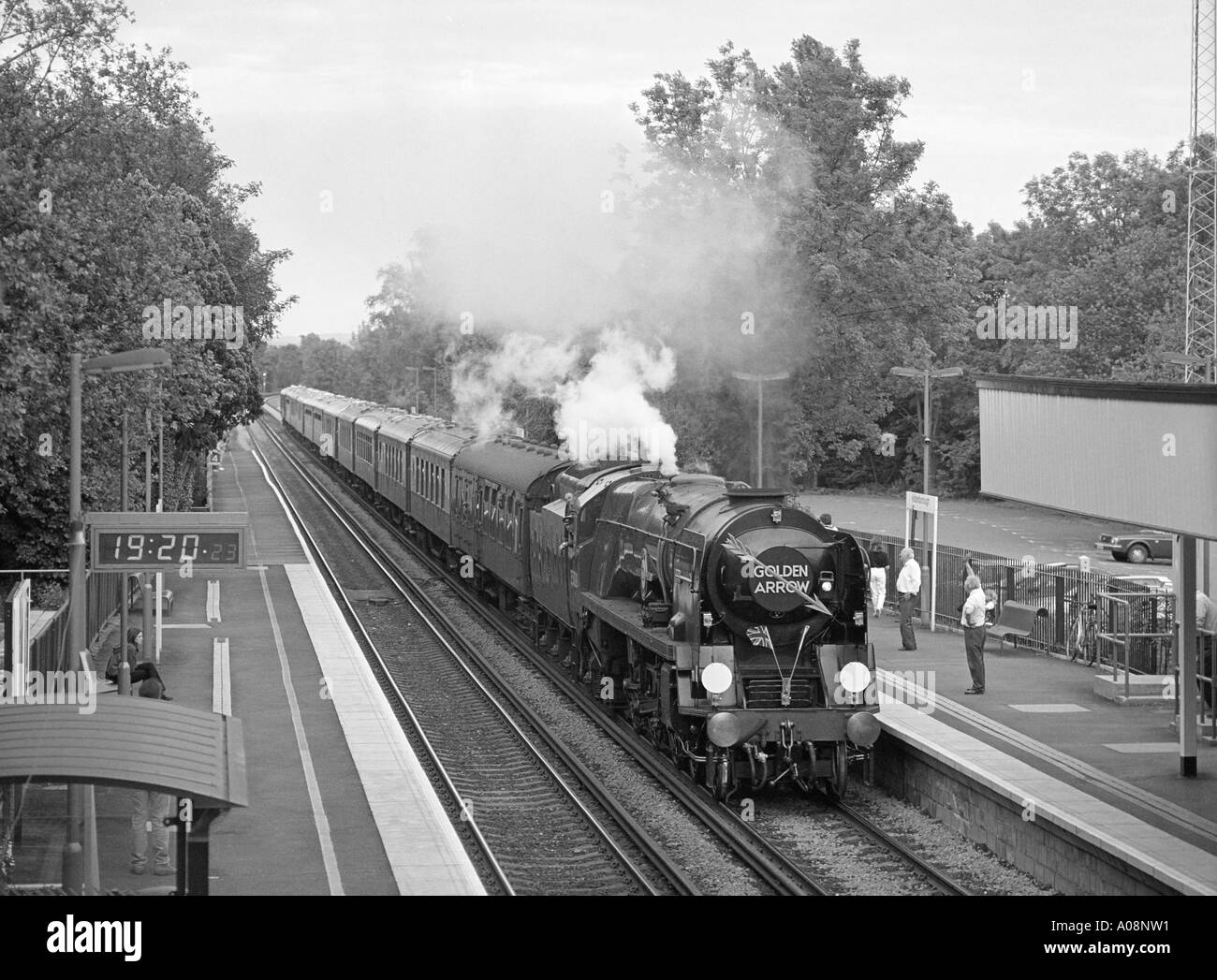 Special charter train with preserved steam locomotive 35028 'Clan Line' passing Hildenborough Station, Kent England. Stock Photo