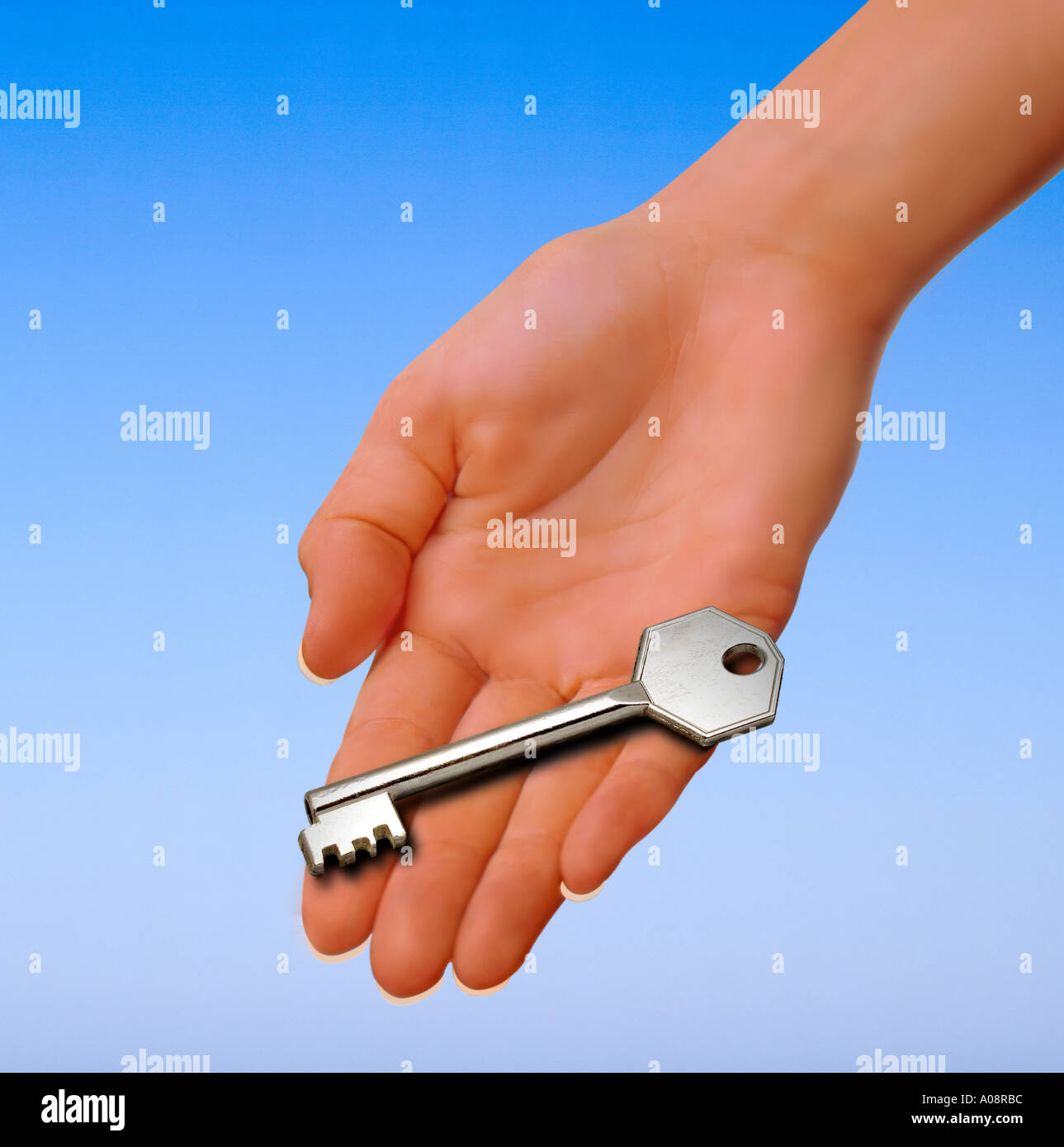 female hand,holding latch key variation Stock Photo