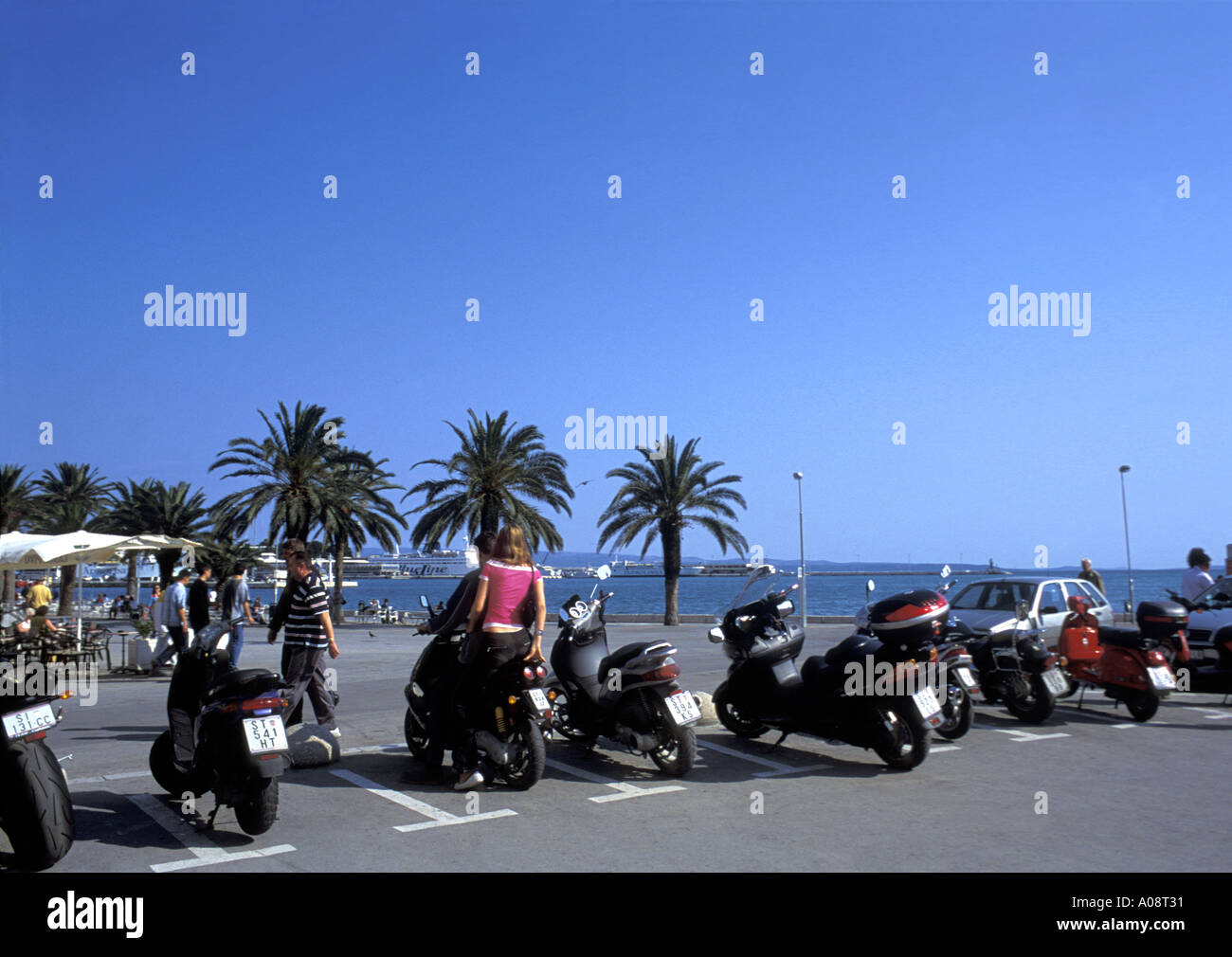 Teenage Bikers on the Riva Waterfront Split Dalmatia Makarska Riviera Croatia Adriatic Sea Stock Photo