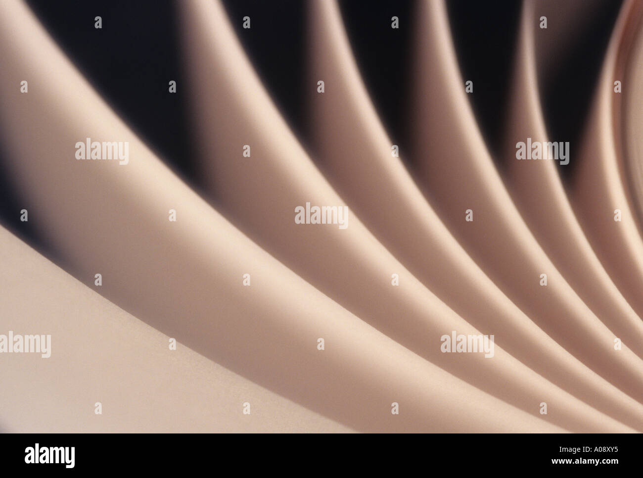 Adding machine tape abstract, spiraling, repetitious patterns. Stock Photo