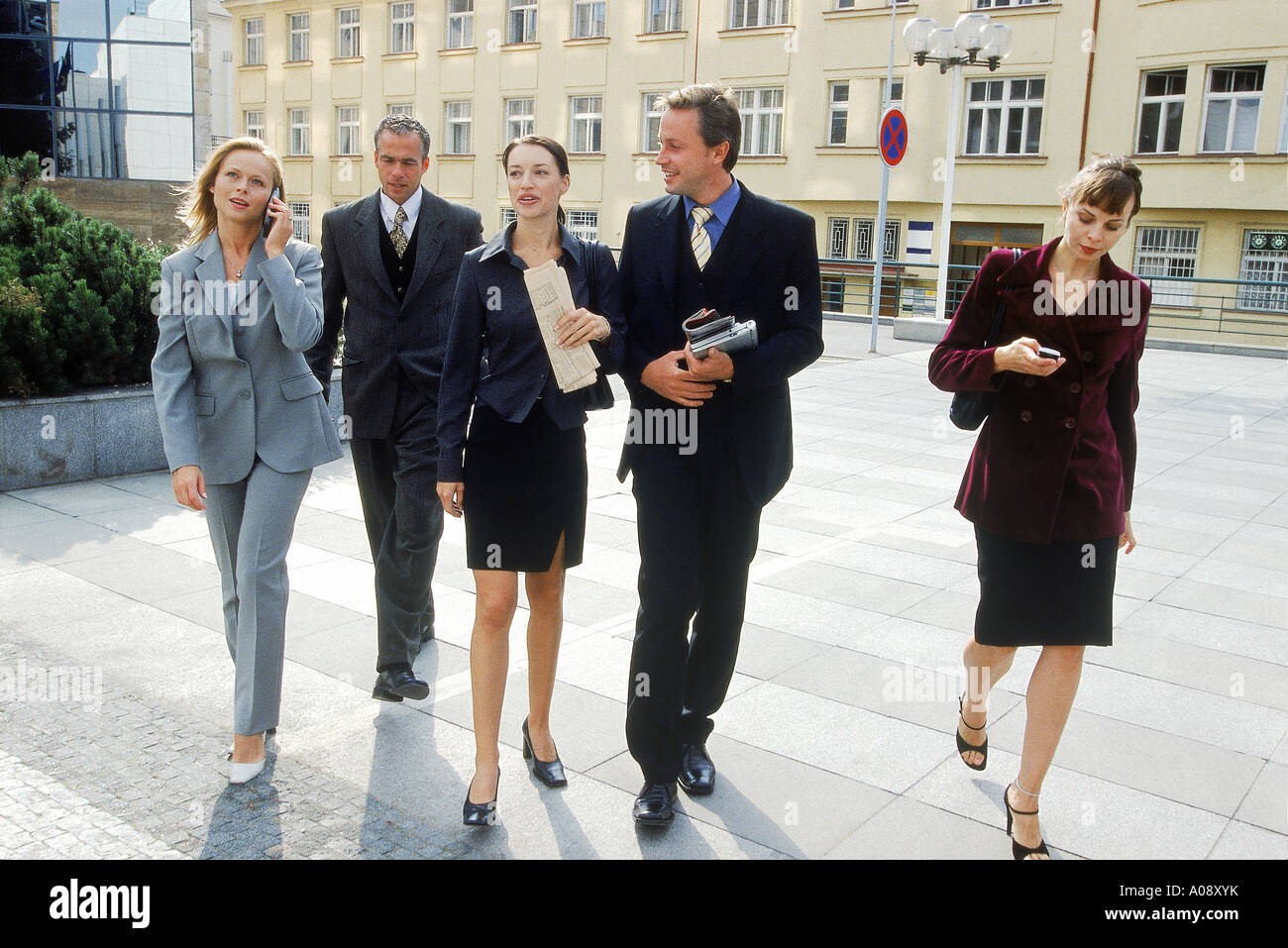 Group mature walking outdoors hi-res stock photography and images - Alamy