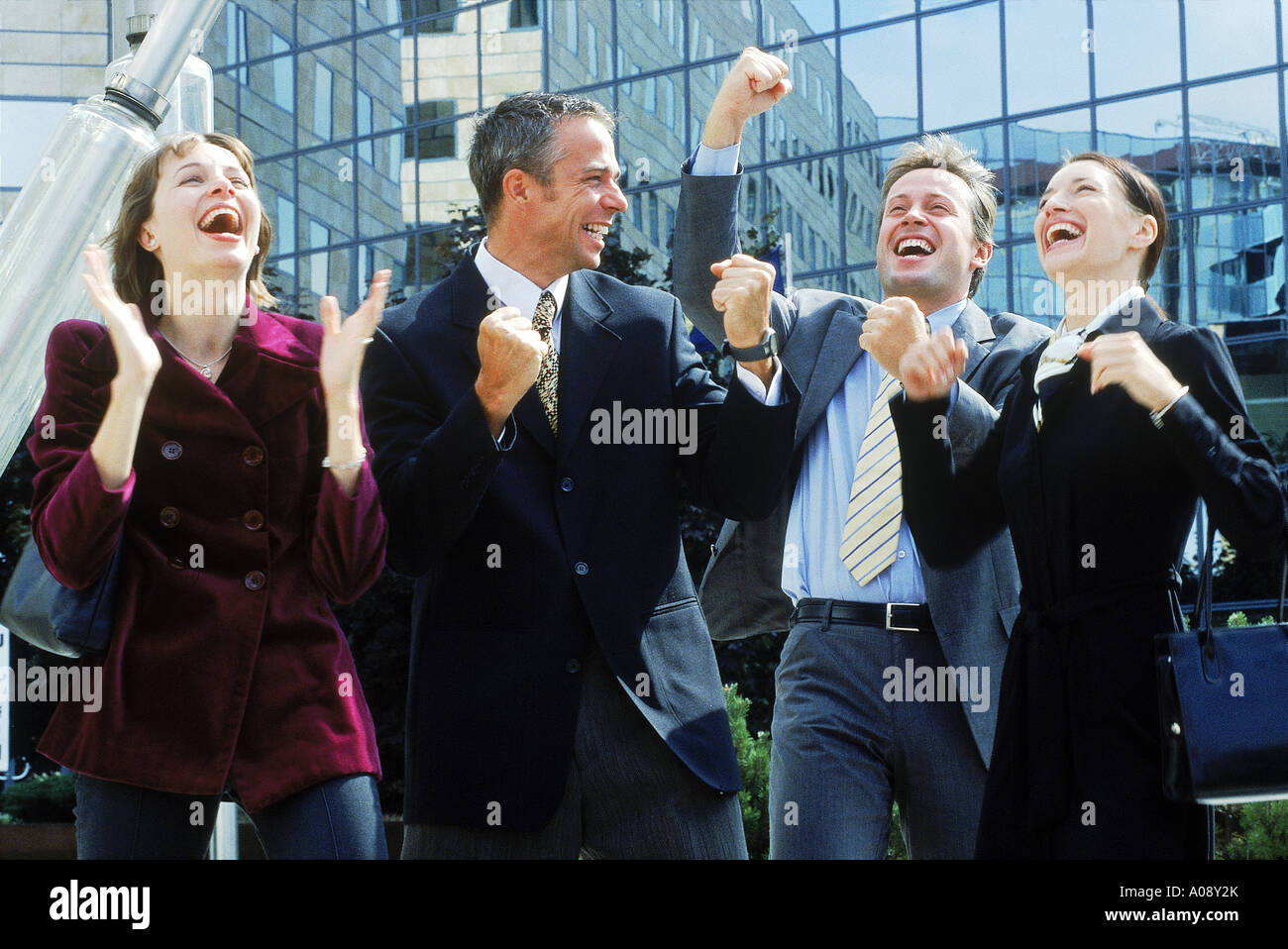 Happy young men celebrating hi-res stock photography and images - Alamy