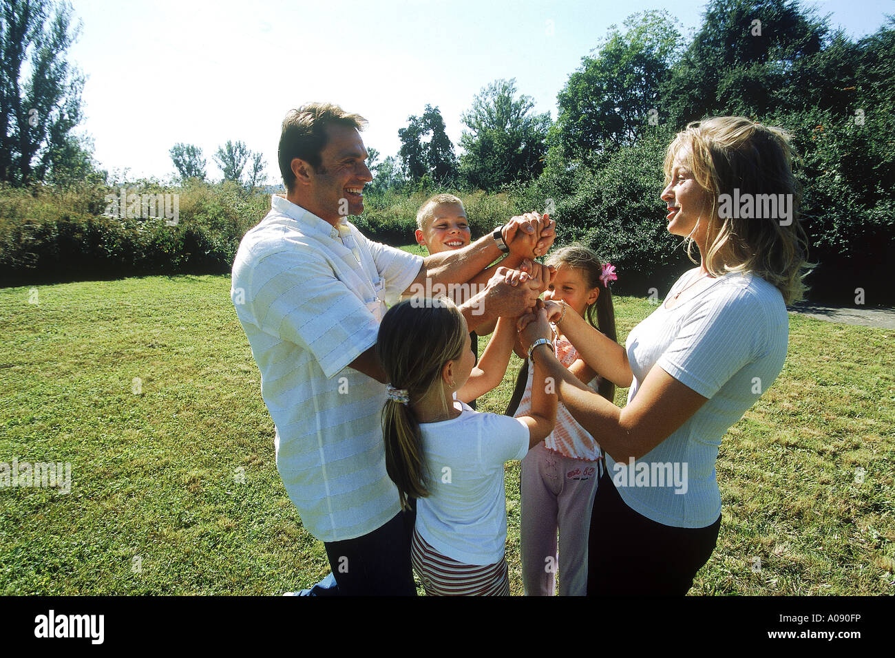 Two girls holding hands hi-res stock photography and images - Alamy