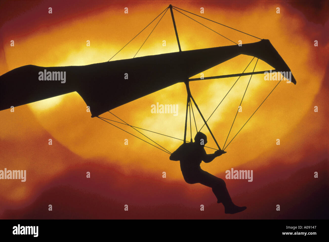 Man flying Hang Glider Stock Photo Alamy