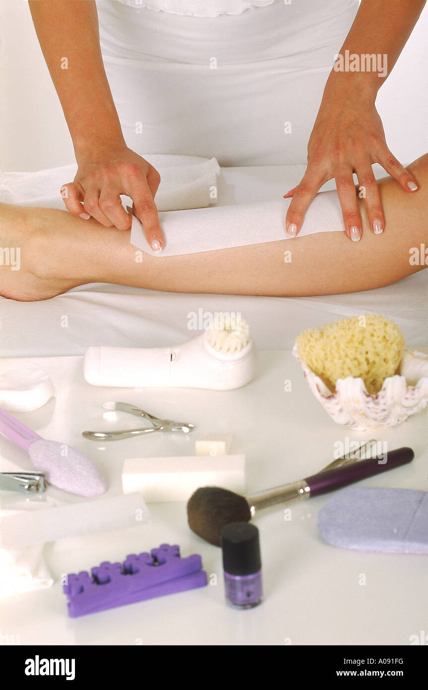 Woman getting her legs waxed Stock Photo Alamy