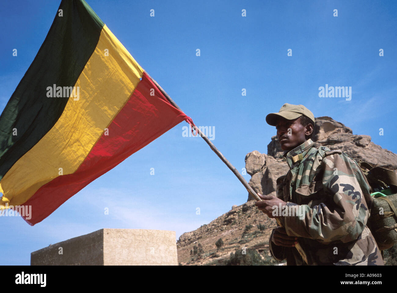 Ethiopian flag carried by Ethiopian soldier during the border conflict with Eritea Stock Photo