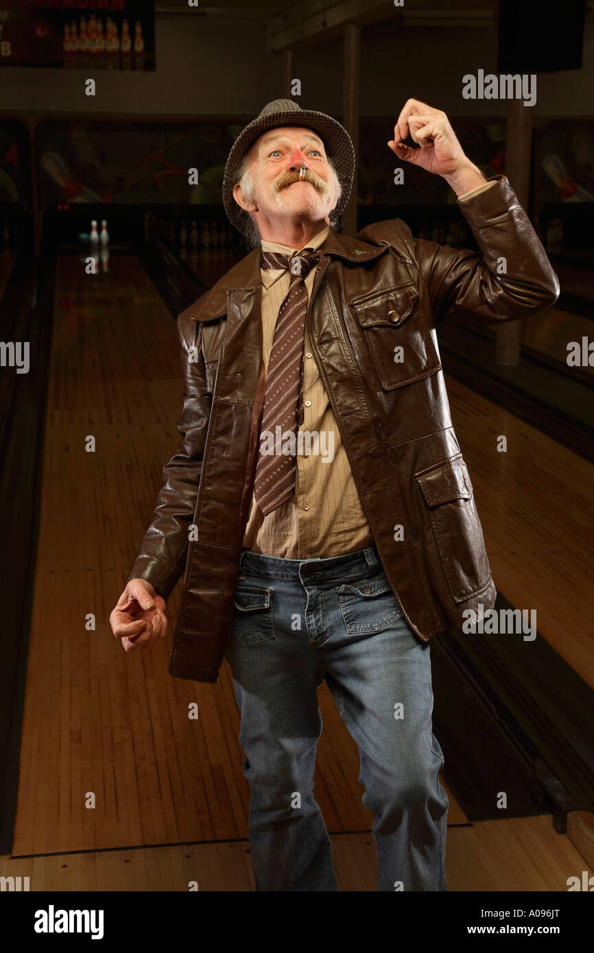 Man Cheering at Bowling Alley Stock Photo