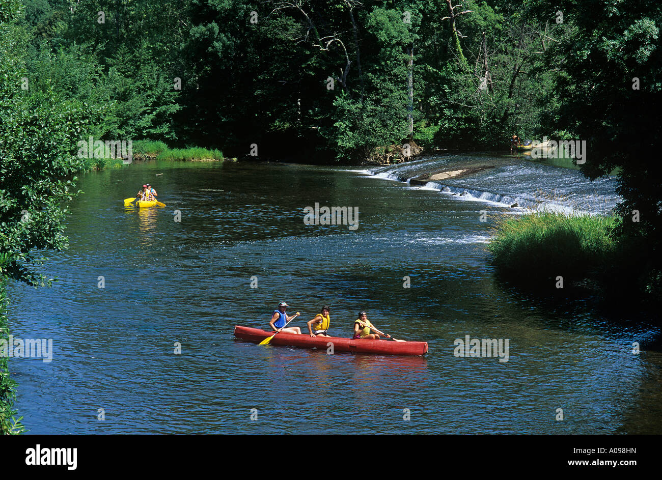 Canoeing on the River Dronne below the ancient town of Bordeilles north of Perigueux Stock Photo