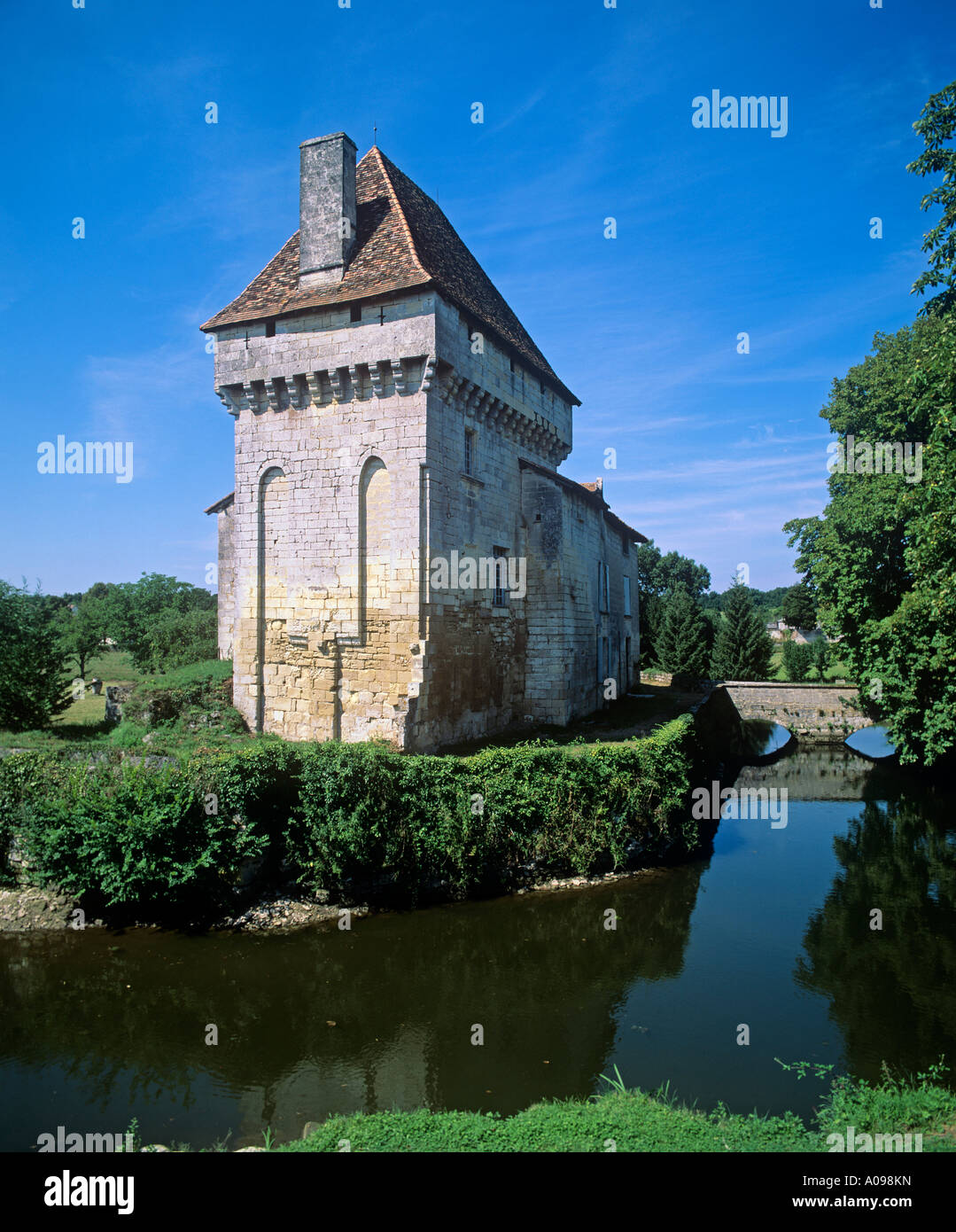 Chateau Chapdeuil small moated castle with fortified tower lived in as a private residence in the NW Dordogne Stock Photo