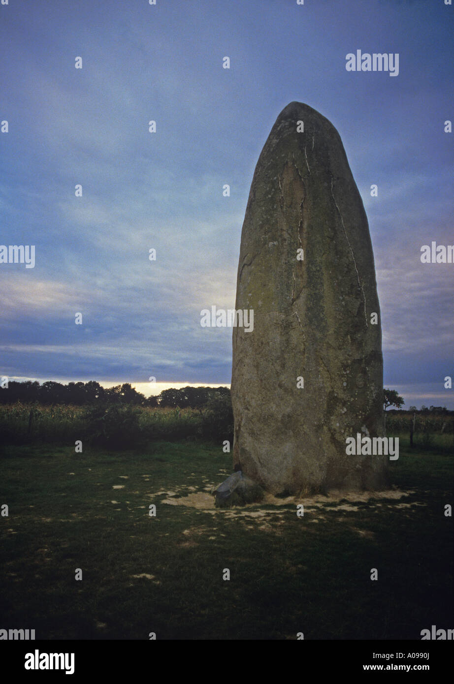 Menhir du Champ Dolent 9+ metres high standing stone outside the small town of Dol in North East Brittany Stock Photo