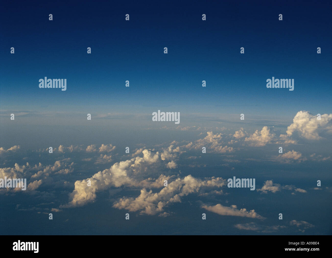 Aerial view of atmospheric sky with scattered white puffy clouds Stock ...