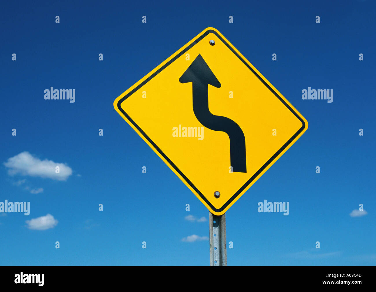 Double Bend Warning Road Sign Stock Photos & Double Bend Warning Road