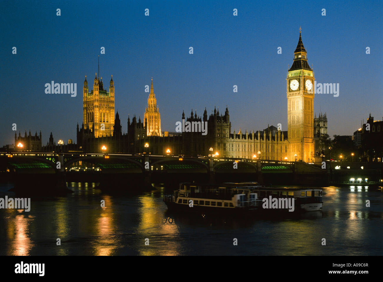 Houses of Parliament floodlit at night Westminster London England GB Stock Photo