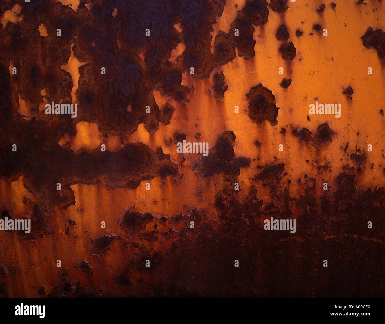 A close up of an aged and weathered chipping corroding peeling rusting ...