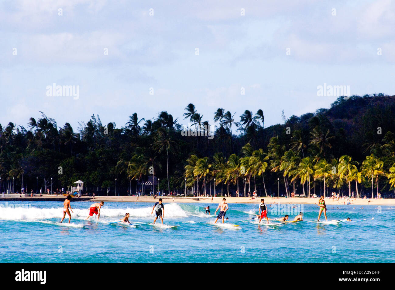 Waikiki surfers riding wave hi-res stock photography and images - Alamy