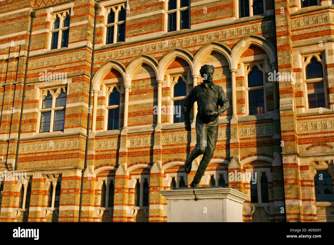 Statue of William Webb Ellis outside Rugby School Rugby Warwickshire England UK Stock Photo