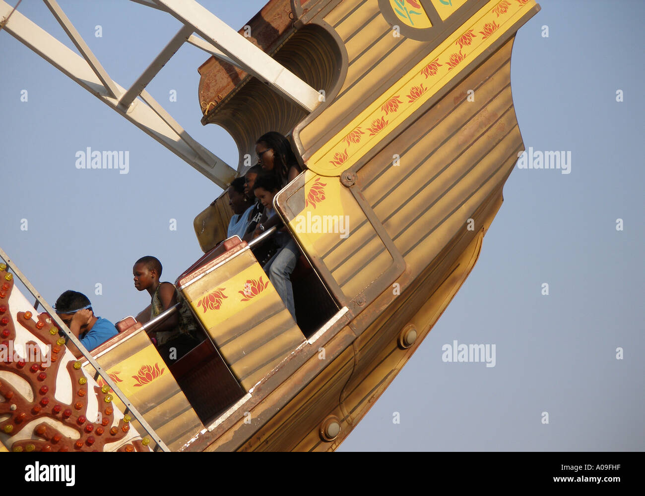 A Ride In The Swinging Ship At A Fun Fair Stock Photo