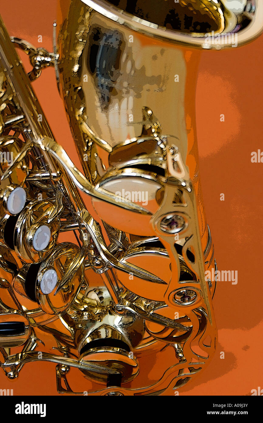 Alto Saxophone against orange background Stock Photo Alamy