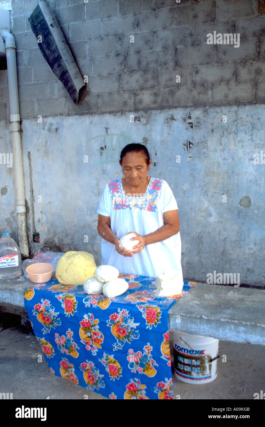 Woman age 74 making bread. Cozumel Mexico Stock Photo