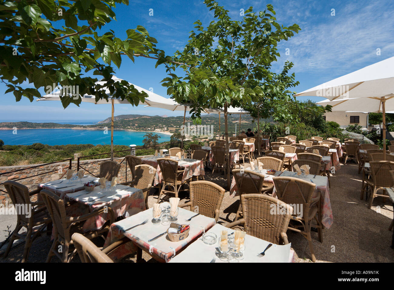 Restaurant overlooking the beach at Cargese, Golfe de Sagone, Corsica, France Stock Photo