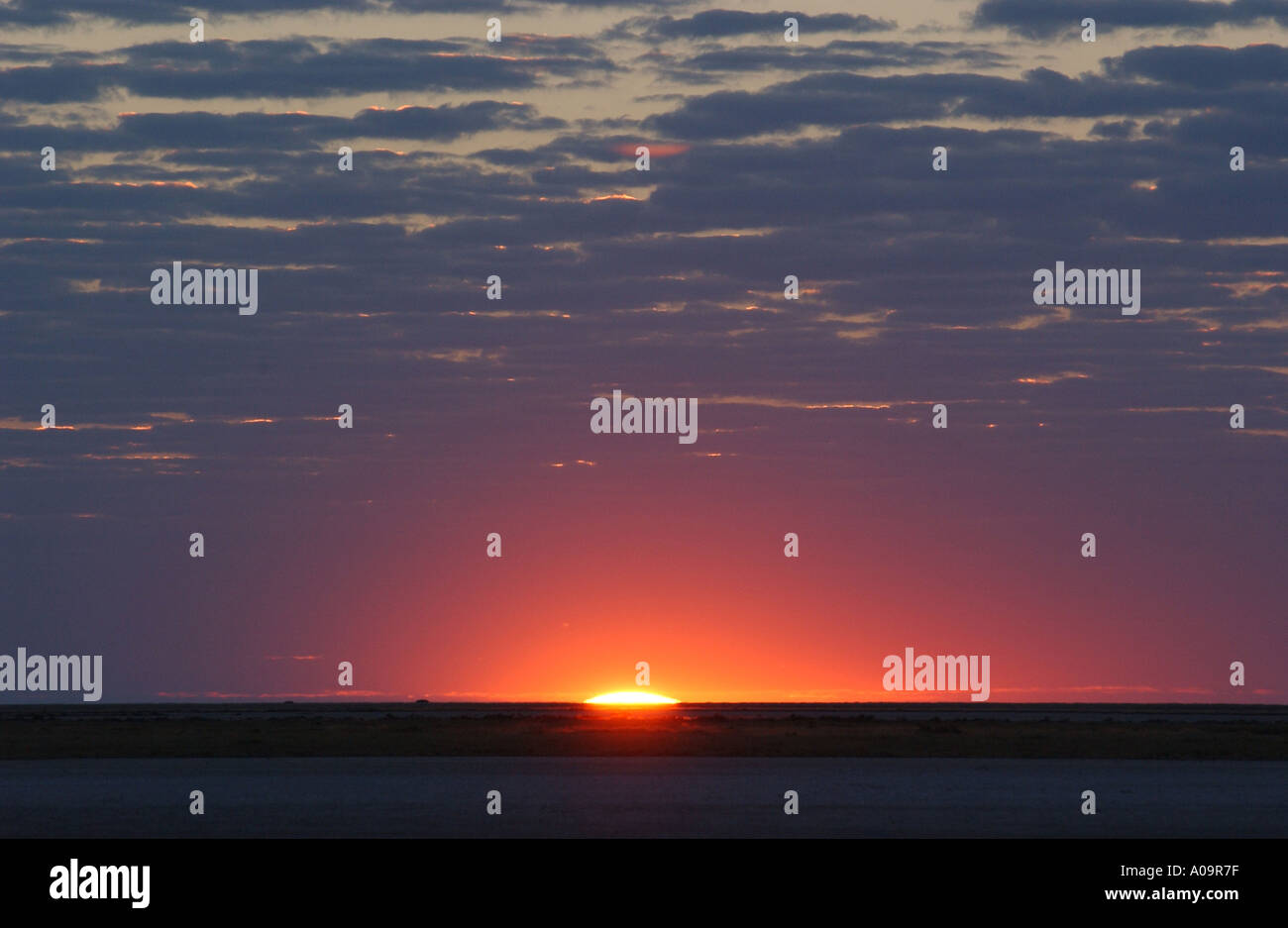 Sunset on the Makadikadi pans Stock Photo