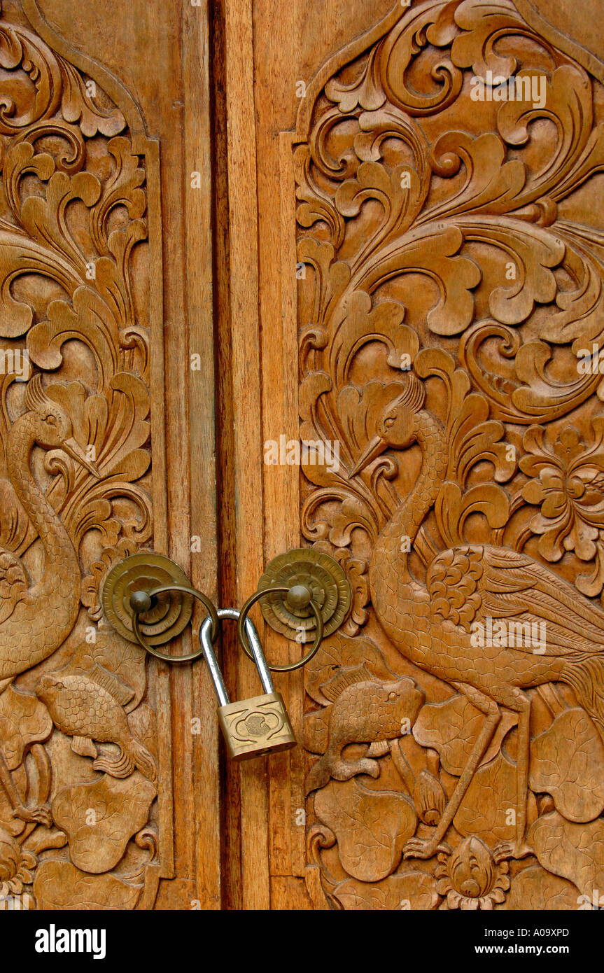 Decorative Balinese wooden carved doors Stock Photo - Alamy