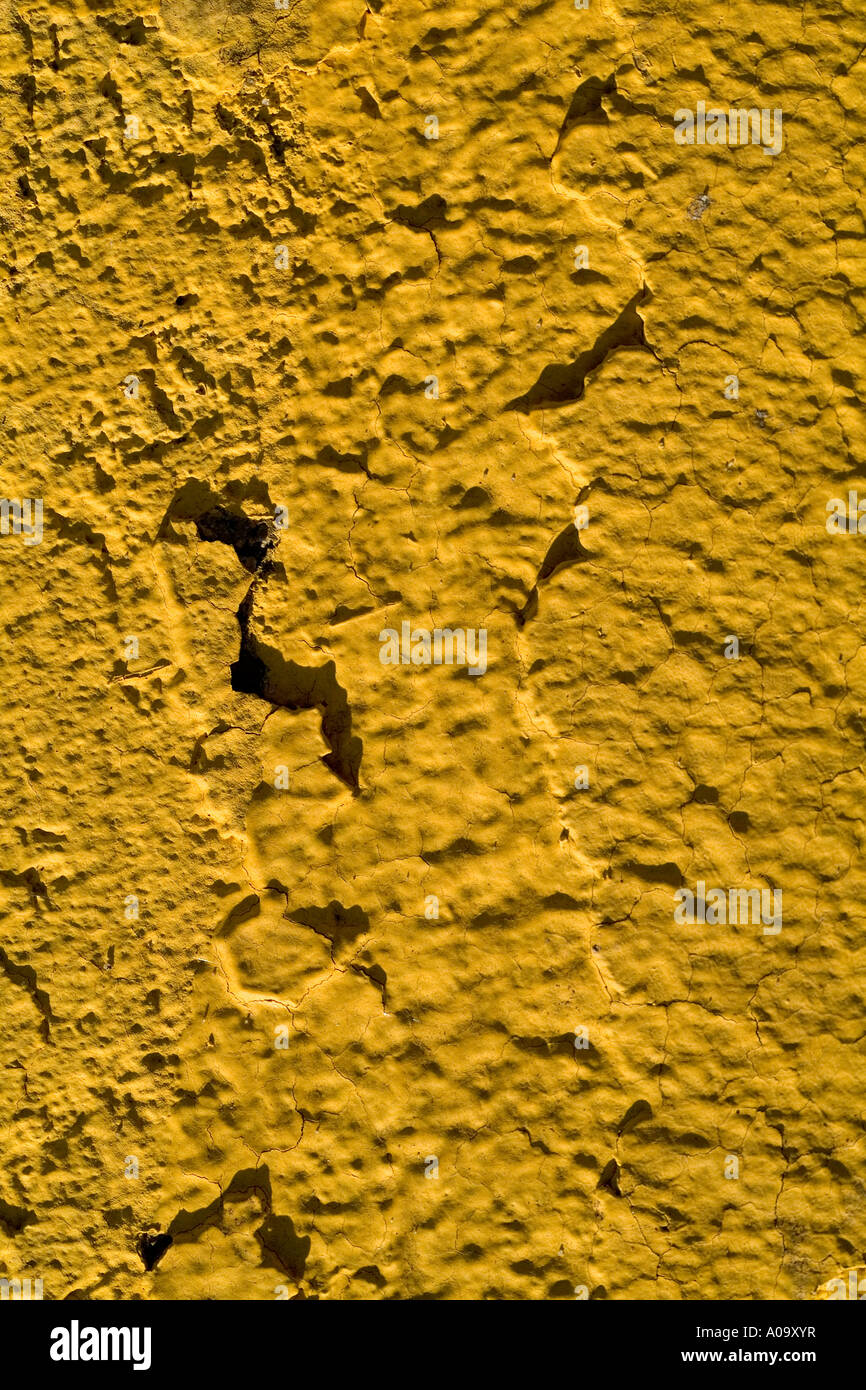 Orange painted wall with raking light forms pattern texture Stock Photo