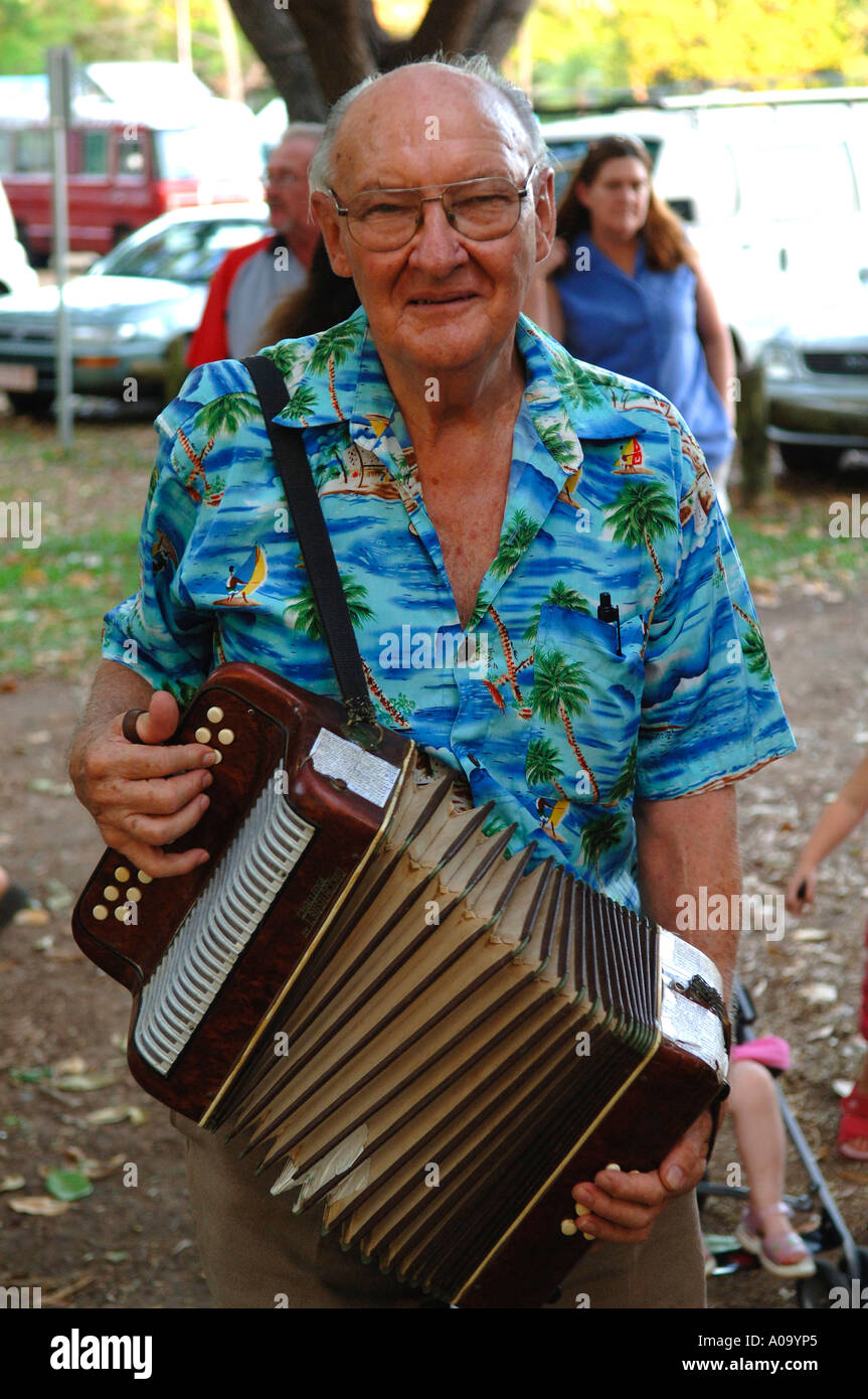 Pernsioner playing the accordian,  Mindil Beach Sunset Market, Darwin Australia Stock Photo