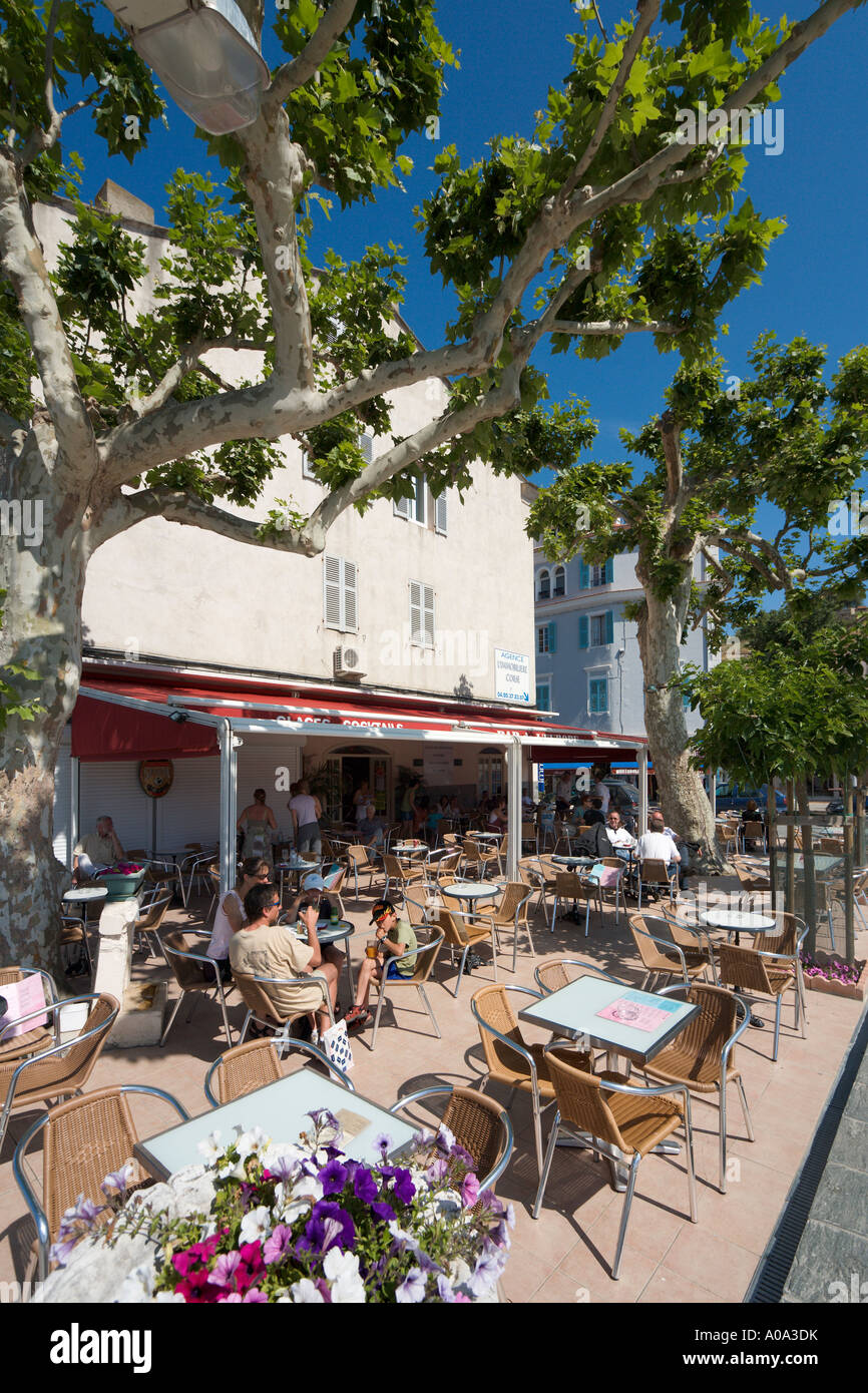 Waterfront cafe by the harbour, St Florent, Nebbio, Corsica, France Stock Photo