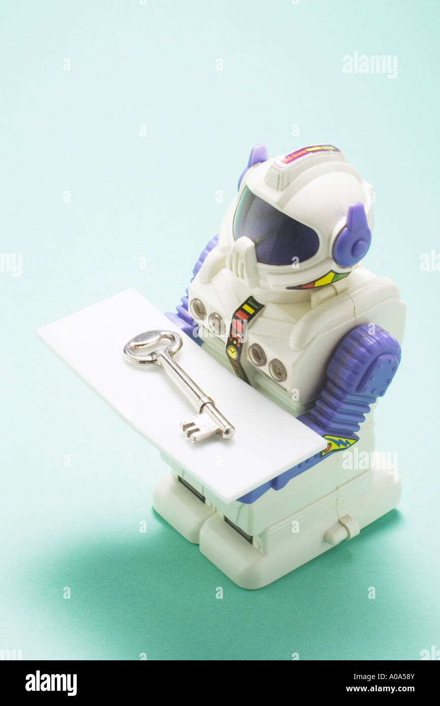 Robot with Key Stock Photo - Alamy