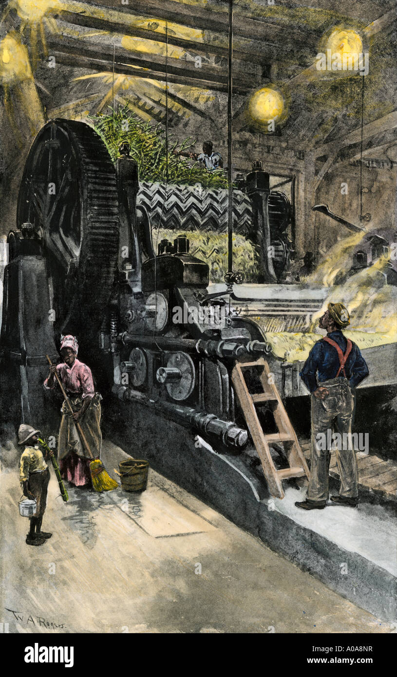 African American workers operating a cane crushing machine in a sugar house at Bayou Teche Louisiana 1900. Hand-colored halftone of an illustration Stock Photo