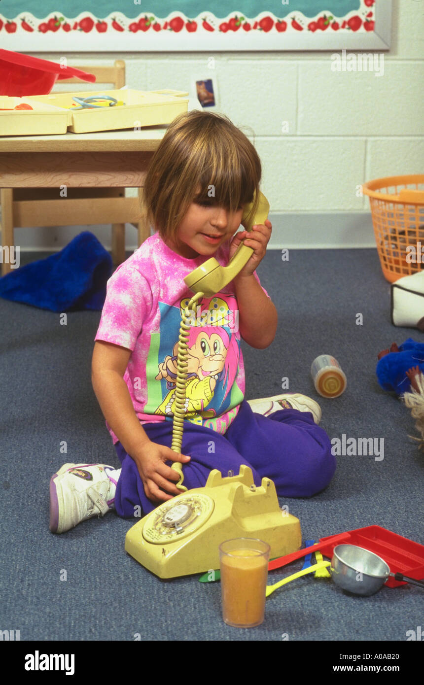 Preschool child playing pretend social development model released Stock