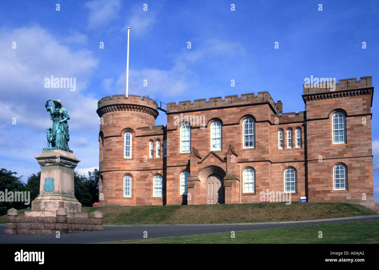 Inverness Castle Inverness Scotland with statue of Flora McDonald in front Stock Photo