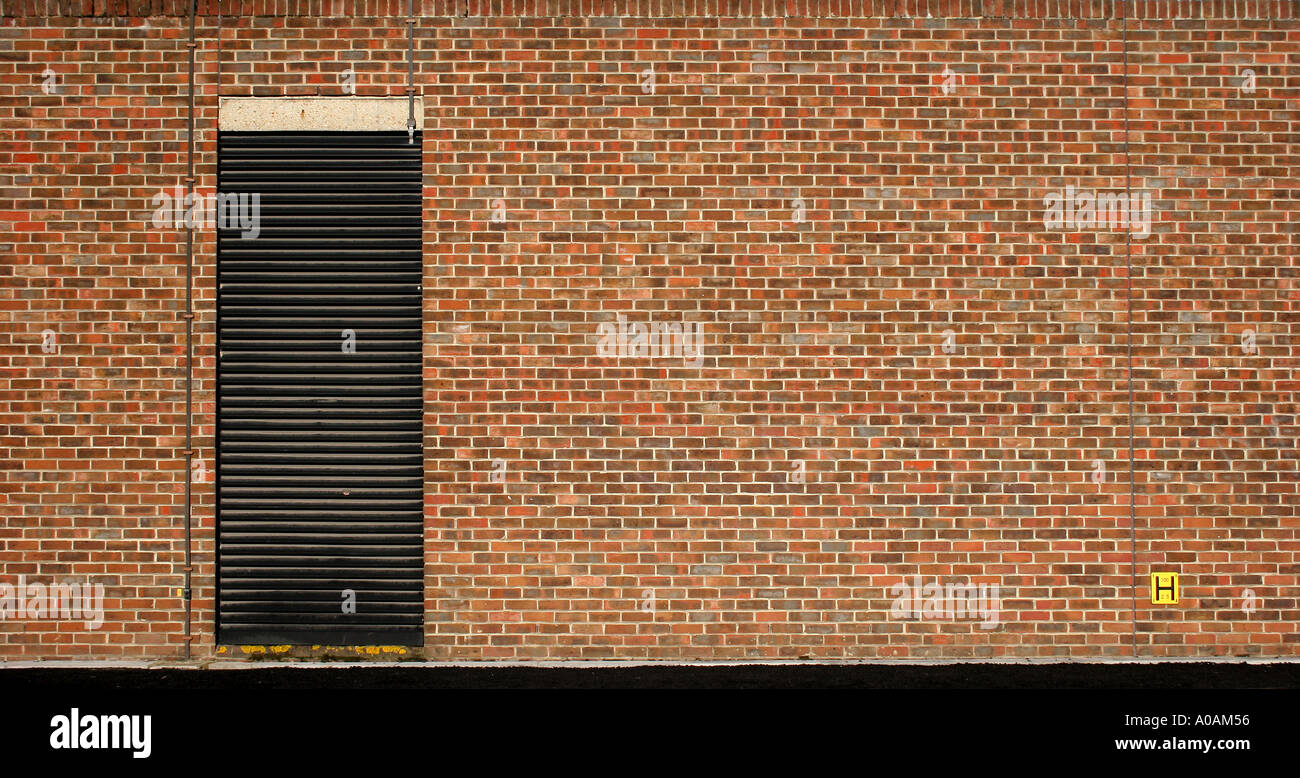 Door in brick wall Stock Photo Alamy