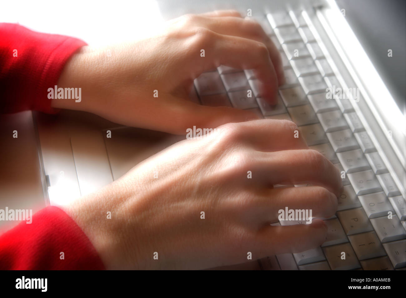 Woman using a laptop Stock Photo